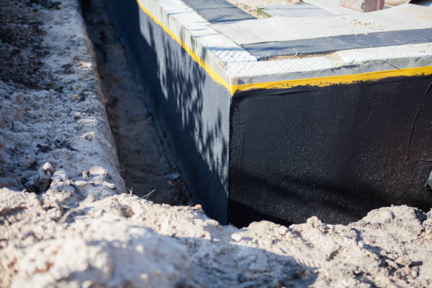 Professional Waterproofing technician working in Fulton, OH